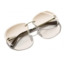 Chanel - Round Sunglasses - Gold Beige - Chanel Eyewear - Avvenice
