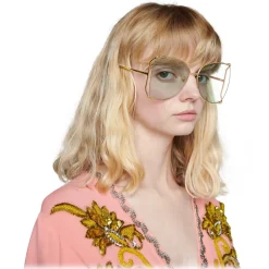 Gucci - Oversize Round Metal Sunglasses - Gold - Gucci Eyewear - Avvenice