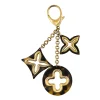 Louis Vuitton Vintage - Insolence Bag Charm - Gold Brown - LV Bag Charm - Luxury High Quality - Avvenice