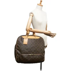 Louis Vuitton Vintage - Monogram Canvas Evasion Bag - Brown - Monogram Canvas and Leather Handbag - Luxury High Quality - Avvenice